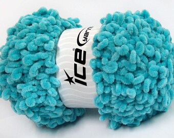 May include: A skein of turquoise blue yarn with a fluffy texture. The yarn is labeled "Ice Yarns".