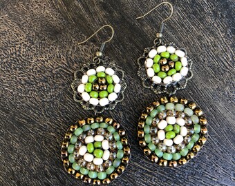 Beaded circle drop earrings in green, bronze and cream