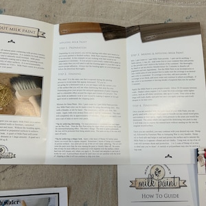 May include: A how-to guide for using milk paint, a natural, environmentally friendly paint. The guide includes instructions for preparing, staining, mixing, applying, and finishing milk paint. The guide also includes a close-up of a brush and a jar of milk paint powder.