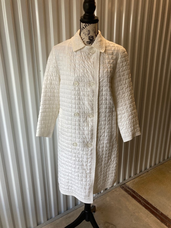 mod white puffy coat Gem