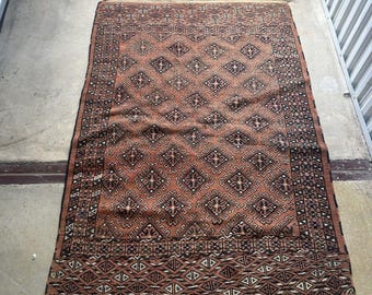 Antique Wool And Silk Rug With A Long Fringe