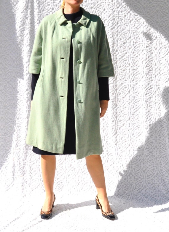 mint green coat