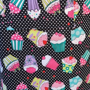 Apron, full length, Amy Lynn Aprons, bib style, black with whimsical cupcake pattern, adult size image 2