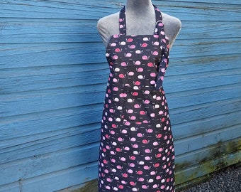 Bib style, full length apron, Amy Lynn Aprons, black apron with fun red and pink snails, adult size clothing protector