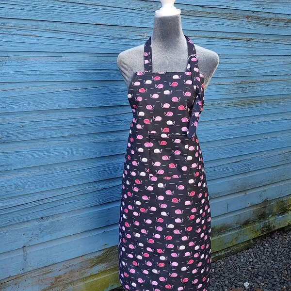 Bib style, full length apron, Amy Lynn Aprons, black apron with fun red and pink snails, adult size clothing protector