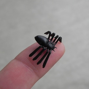 Tiny store plastic spiders