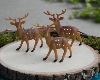 small plastic deer figurines