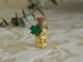 St. Patrick's Day miniature accessories, faux tiny gold coins nuggets in glass bottle, lucky four leaf clover, fairy garden miniatures 