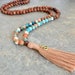 see more listings in the TASSEL MALA NECKLACE section