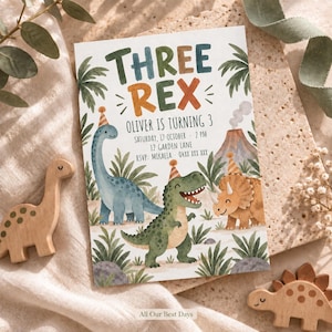 May include: A rectangular birthday invitation card featuring watercolor illustrations of three dinosaurs wearing party hats. The text reads THREE REX, OLIVER IS TURNING 3, SATURDAY, 17 OCTOBER, 2 PM, 12 GARDEN LANE, and RSVP: MIKAELA 04XX XXX XXX.