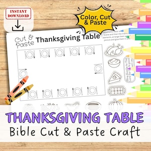May include: A black and white Thanksgiving table cut and paste craft. The printable features a table setting with plates, forks, and knives. Includes cut-out images of a turkey, pie, and other Thanksgiving foods. The text reads "Thanksgiving Table Bible Cut & Paste Craft."