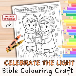 May include: Black and white coloring page with the text "CELEBRATE THE LIGHT" and "Bible Colouring Craft". The image features two children holding a lantern, pumpkins, and fall leaves. Two crayons are on the left side.