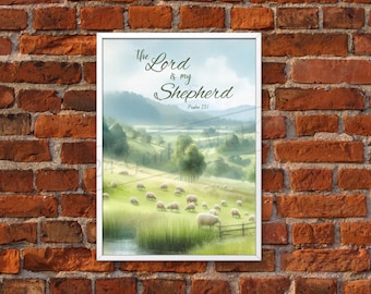 May include: A white framed print with a watercolor painting of a green grassy field with white sheep. The text "The Lord is my Shepherd, Psalm 23:1" is printed in brown at the top of the image.