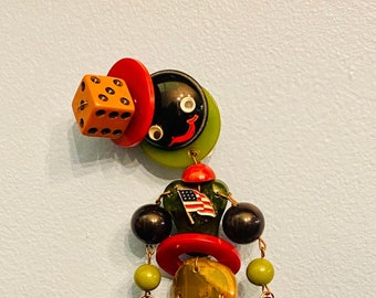 Uncle Sam Patriotic Jan Carlin Figural Cribtoy Style Brooch utilizing vintage Bakelite methods and materials