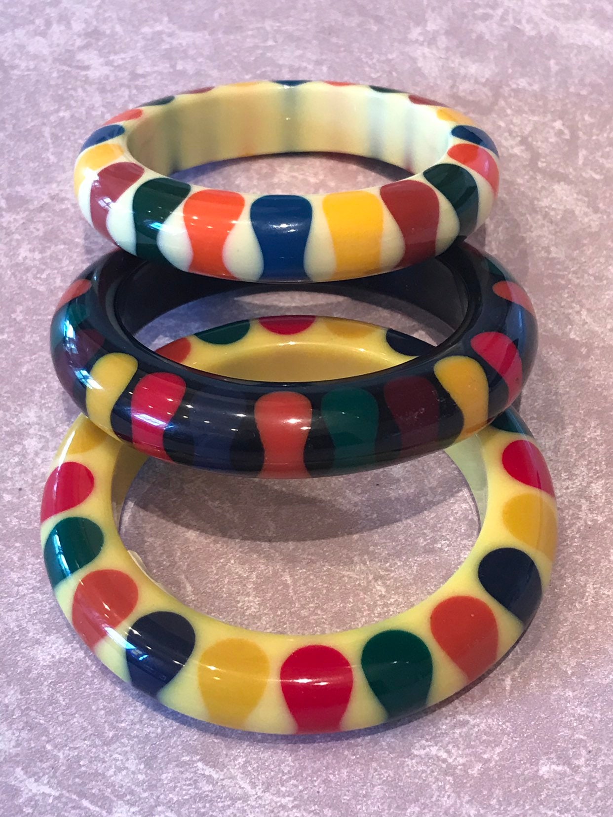 The McGuire Group LLC - Auction: 115: Great Assortment of Collectibles In  TMG Online Auction Ending April 29 ITEM: Rainbow and Green Bakelite Stretch  Bracelet Signed by Artisan G. Paul.