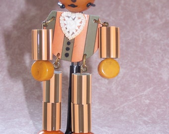 Adorable  Crib Toy Style Bakelite Man