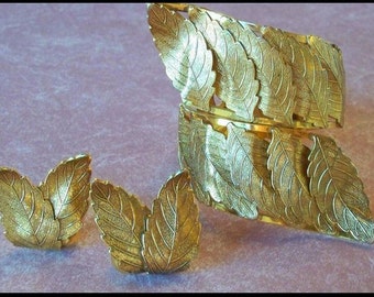 Vargas Gold Tone Leaves clamper bracelet and earrings