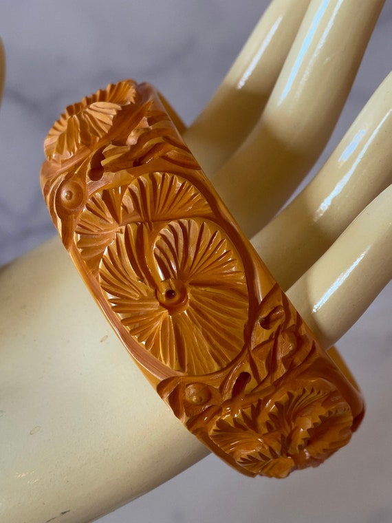 Intricately Carved and pierced Butterscotch  Vinta