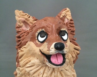 Pomeranian dog figurine