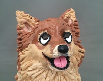 Pomeranian dog figurine