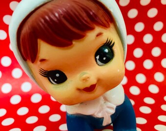 baby doll with big eyes