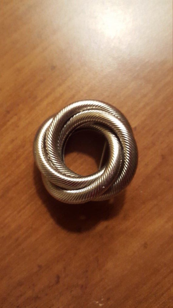 Unique Vintage Silvertone Metal Swirl Round Brooch