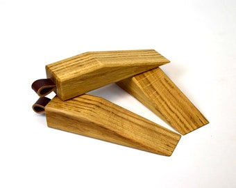 Oak and leather wedge doorstops