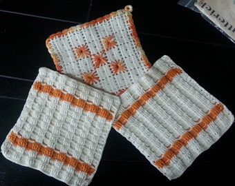 Pot holders, three square vintage crochet hot pot holders in orange and cream