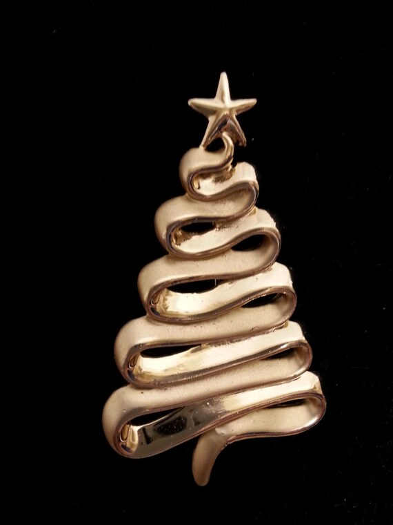 Stylized ribbon Christmas tree gold tone.