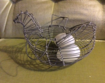 Wire chicken and two blown glass eggs