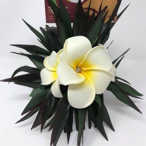 Hawaiian Pua Melia/Plumeria flower. Foam flowers with ti leaves on clip or comb. Perfect for any Polynesian event, beach wedding, luau, gift