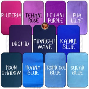 May include: A collection of eleven rectangular fabric swatches in various shades of pink, purple, and blue. Each swatch is labeled with text including Plumeria, Tehani Rose, Leilani Purple, Pua Lilac, Orchid, Midnight Wave, Kainui Blue, Moon Shadow, Moana Blue, Tropicool Blue, and Sugar Blue.