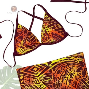 May include: A two-piece bikini set with a vibrant, patterned design. The top is a triangle style with thin straps, and the bottoms are a matching sarong. The pattern features yellow and orange geometric shapes on a maroon background. The bikini is designed for swimwear.