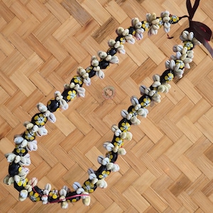 Hawaiian Kukui Nut Shell Lei or Necklace With Hand-Painted Yellow Hibiscus Flower.