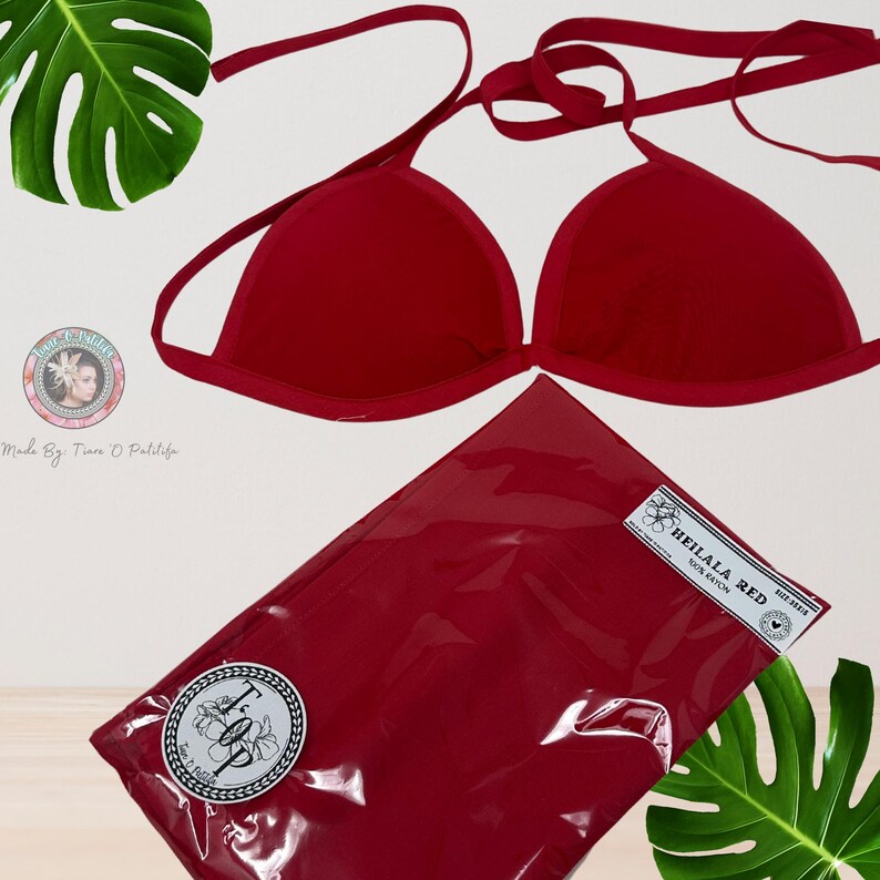 May include: Red bikini top with adjustable straps and a halter neck style. The top is made of a soft, stretchy fabric and has a triangle shape. The top is packaged in a clear plastic bag with a red label that says "Heilala Red Sun Rayon".