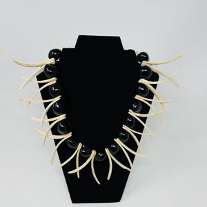 Samoan kukui Ula. Handmade Authentic Wood Sticks & Kukui Nut Beads Neckpiece. Samoan 22&quot; Ula. Tamaroa Neckpiece. Our Tagaloa Neckpiece..