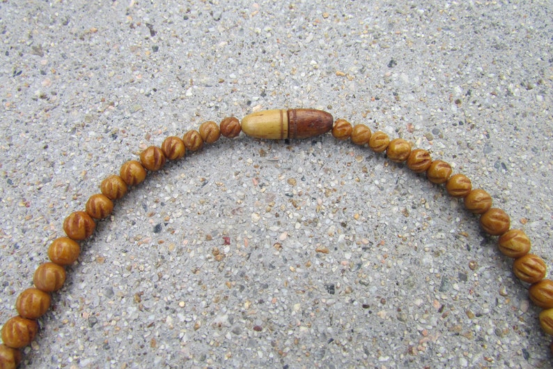Vintage carved old bone necklace Graduated carved beads 71 carved bone beads