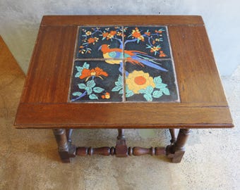 Taylor Tile Colorful Parrot, floral, foliage motif tiles side table carved wooden frame early California Spanish Revival Arts & Crafts