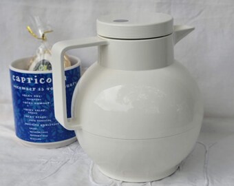 retro coffee water thermos, white plastic pitcher, glass insulated tea pot, picnic park dorm gathering, hot cold soup broth insulator