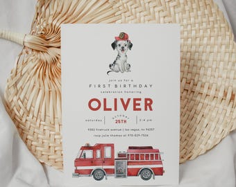 May include: A red and white first birthday party invitation with a Dalmatian dog wearing a firefighter hat. The invitation says "Join us for a First Birthday celebration honoring Oliver" and includes the date, time, and location of the party.
