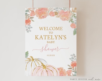 May include: A baby shower welcome sign with floral accents. The sign features the text "WELCOME TO KATELYN'S BABY shower" in gold and pink. Two pumpkins with gold accents are at the bottom. The date 10.20.XX is also included.
