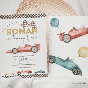 May include: A printable invitation for a first birthday party with a race car theme. The invitation features a red, blue, and yellow watercolor illustration of race cars and balloons. The text on the invitation reads "Race on over Roman is turning one, please join us to celebrate October 3rd, 2:00 pm, the Thomas home, 1234 Racer Boulevard Anywhere, US 12345, RSVP to Jamie at 123-456-7890".