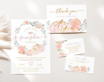 May include: A set of baby shower invitations and cards with a pink pumpkin theme. The main invitation features a wreath of flowers and the text "A Sweet Little Pumpkin is on Her Way." Other cards include "Thank You" and "Books for Baby."