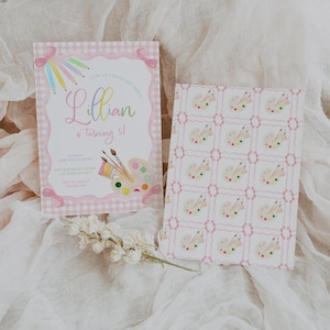May include: Pink and white invitation with a gingham pattern. The invitation says "Join us for an art party! Lillian is turning 5!" with a watercolor illustration of paintbrushes and a paint palette. The back of the invitation has a repeating pattern of paint palettes.