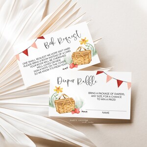 May include: Two printable cards with a picnic basket theme. The top card says "Book Request" and asks guests to bring a book instead of a card. The bottom card says "Diaper Raffle" and asks guests to bring a package of diapers for a chance to win a prize.