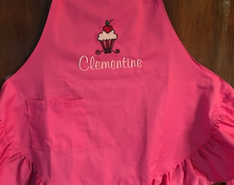 Perfect for child with unique name! Free personalizing machine embroidered child's pink ruffled apron