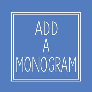 May include: A square graphic on a blue background with white text that reads "ADD A MONOGRAM" inside a white border. The text is in a sans-serif font.