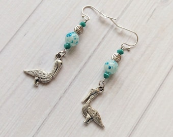 Silverstone Pelican Earrings with Aqua Beads