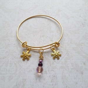 Goldtone Snowflake Charm Bracelet with Purple Bead Dangle image 2