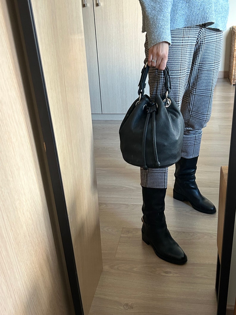 black leather bucket bag